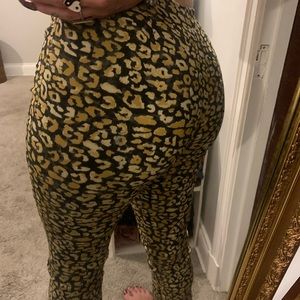 Gold & Black Cheetah Print Flare Capri’s— 74% Rayon. 23% Nylon. 3% Spandex.